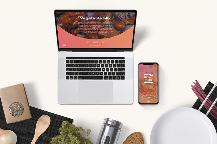 Ordinateur portable et iPhone sur un fond de cuisine