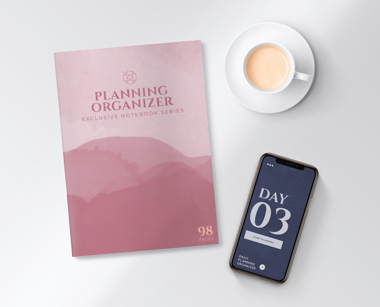 iPhone junto a un cuadernillo y una taza de café