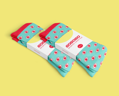 Two Sock Packages on a Yellow Background