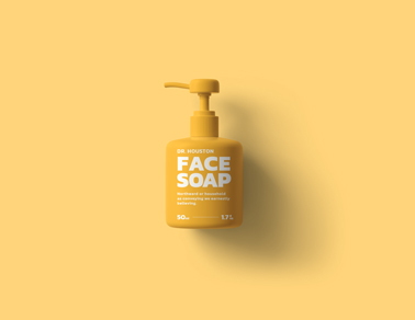 Frasco Doseador de Sabão em um Fundo Amarelo
