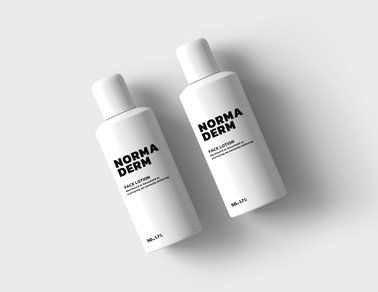 Dois Frascos de Cosméticos em uma Superfície Branca