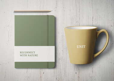 Caderno, uma Xícara de Café e um Lápis