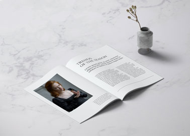 A Magazine Page on a Marble Surface
