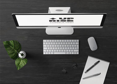 iMac com Materiais de Escritório em uma Superfície Preta
