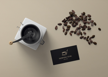 Coffee Pot With Beans and a Business Card