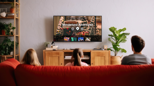 Vater und Kinder beim Fernsehen