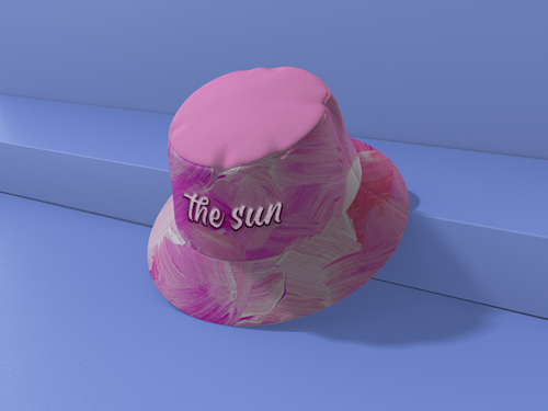 Gorro de verano apoyado en una pared