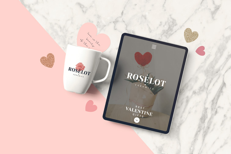 Tablet und Tasse auf einem Valentinstag Hintergrund