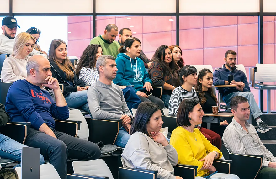 Renderforest team at a talk