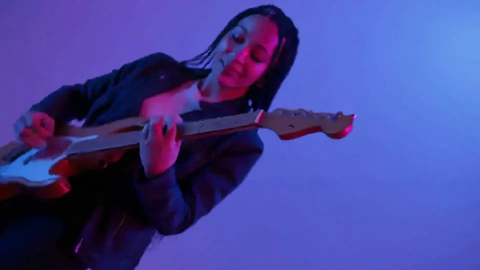Guitarist in neon light