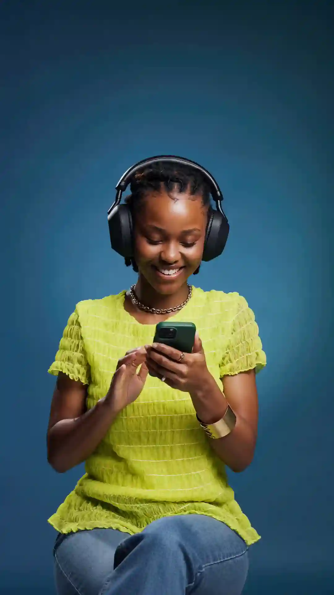 Listener in lime, headphones on