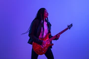 Guitarist in neon light