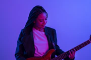 Guitarist with electric guitar
