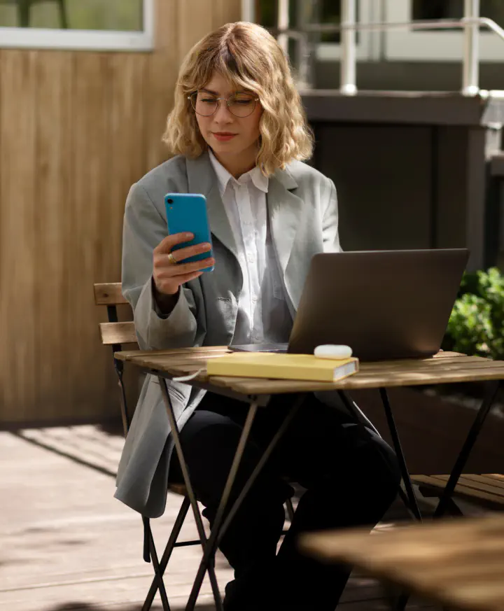 Marketer checking her phone