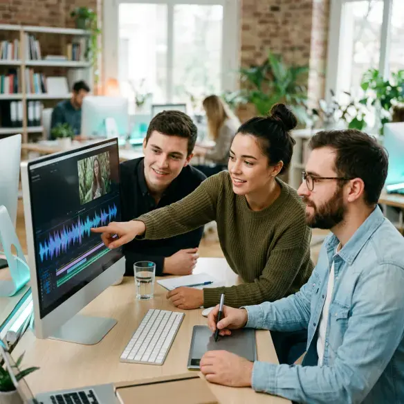 Marketing team reviewing an edit