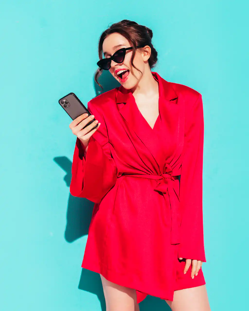 Marketer in red on her phone